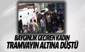 Baygınlık geçiren kadın tramvayın altına düştü