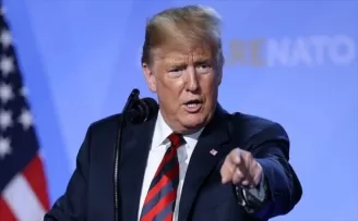 Trump taş atacak göçmenleri tehdit etti